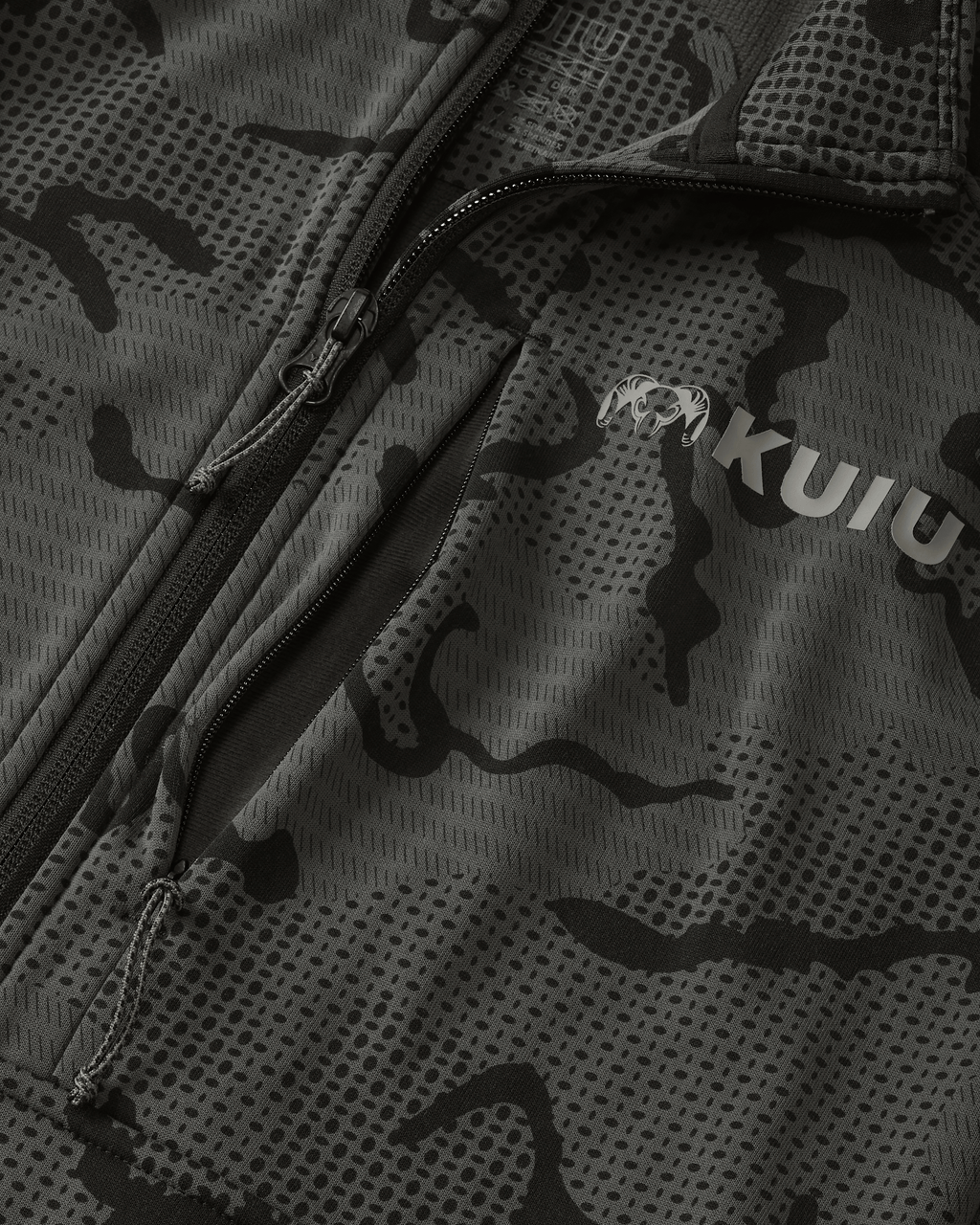 Close-up view highlighting front unzipped left chest pocket and half Zip-T feature on Ridgepoint Fleece Zip-T in Black Tonal Pattern