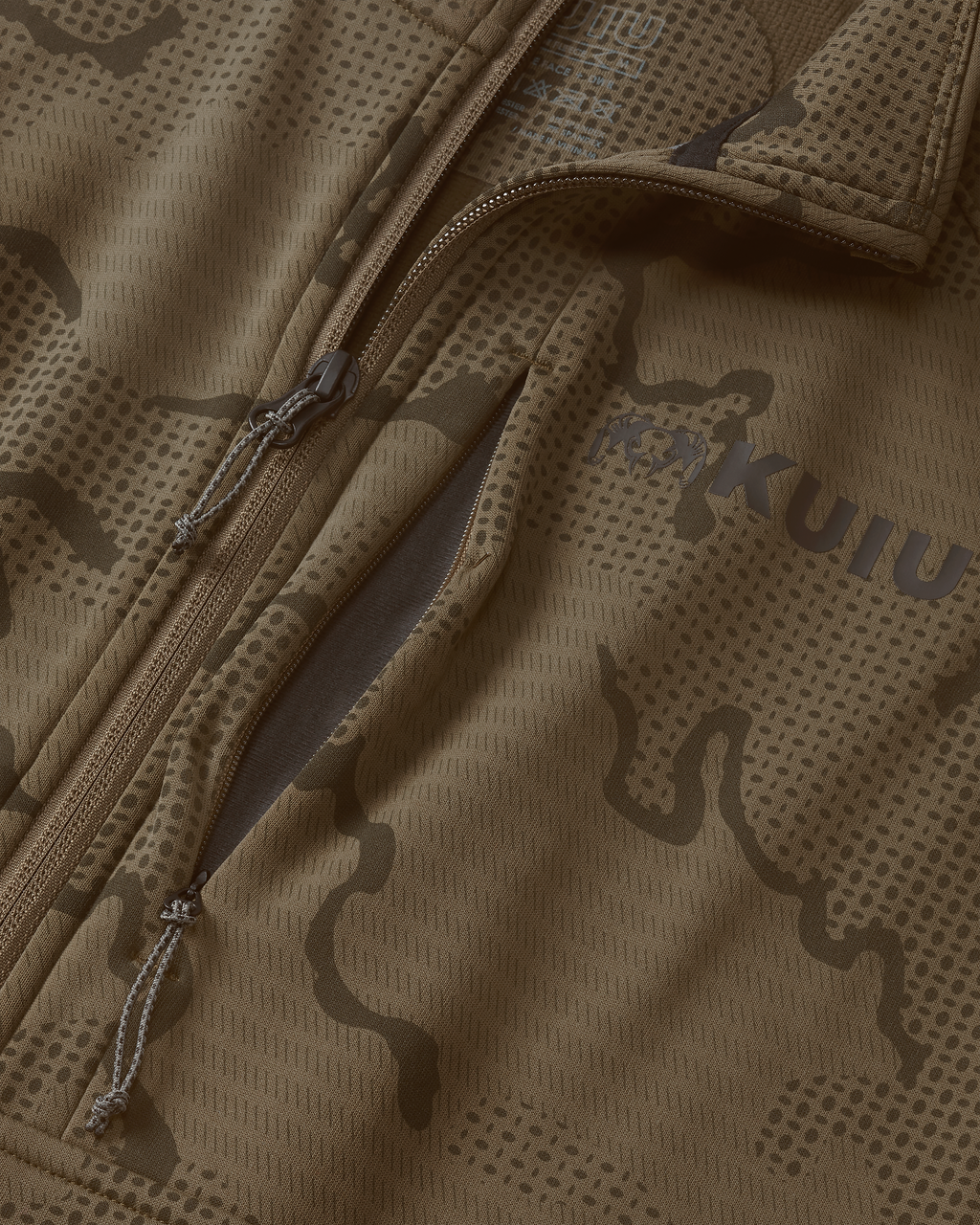 Close-up view highlighting front unzipped left chest pocket and half Zip-T feature on Ridgepoint Fleece Zip-T in Coyote Brown Tonal Pattern