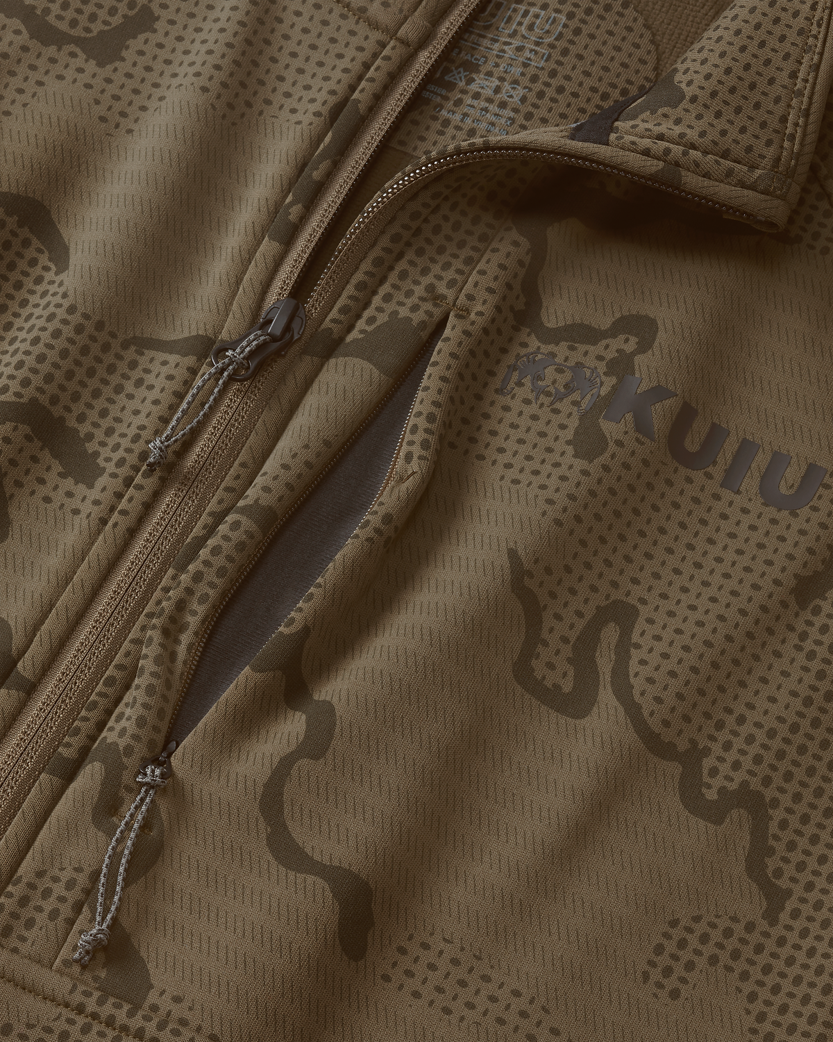 Close-up view highlighting front unzipped left chest pocket and half Zip-T feature on Ridgepoint Fleece Zip-T in Coyote Brown Tonal Pattern