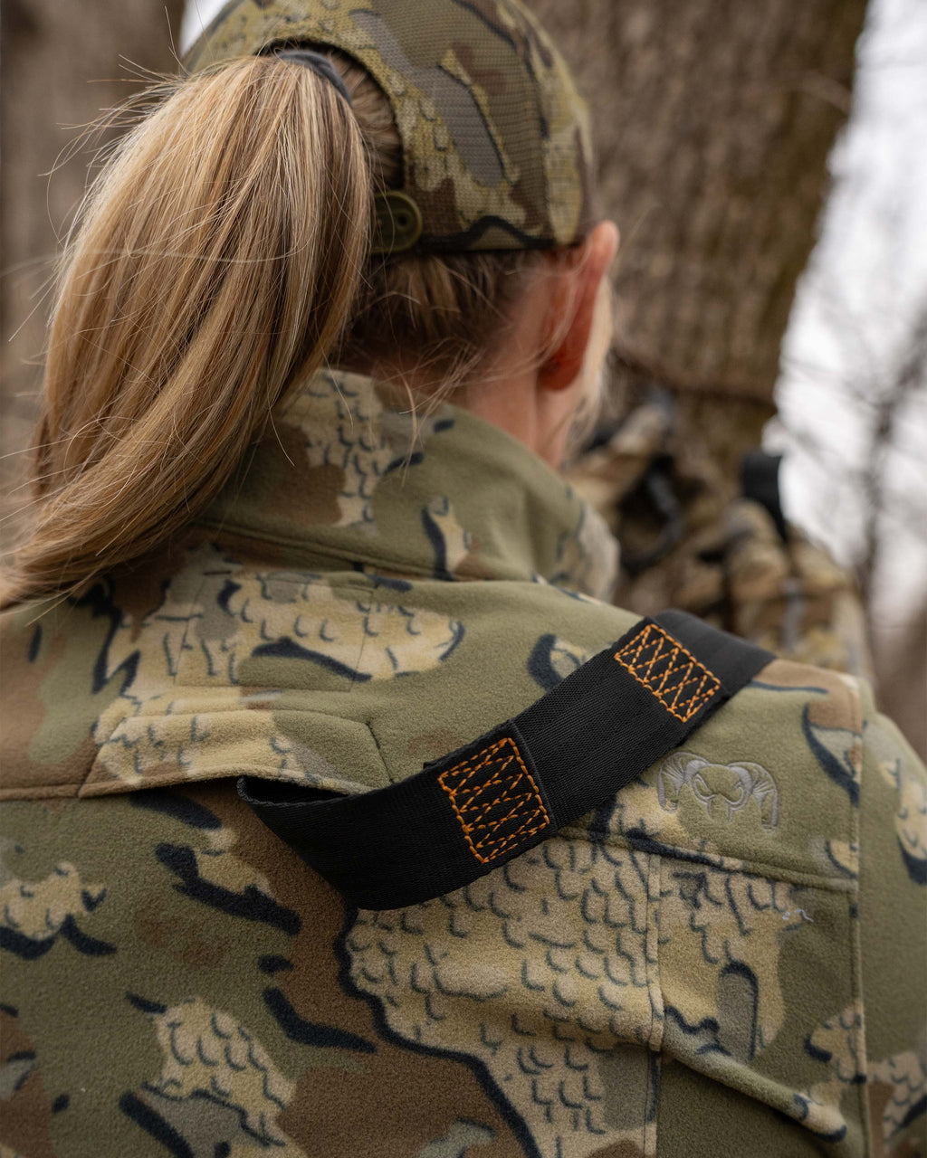 Close-up of back safety harness port on the Women's Border Fleece Full Zip Jacket in Valo Camouflage