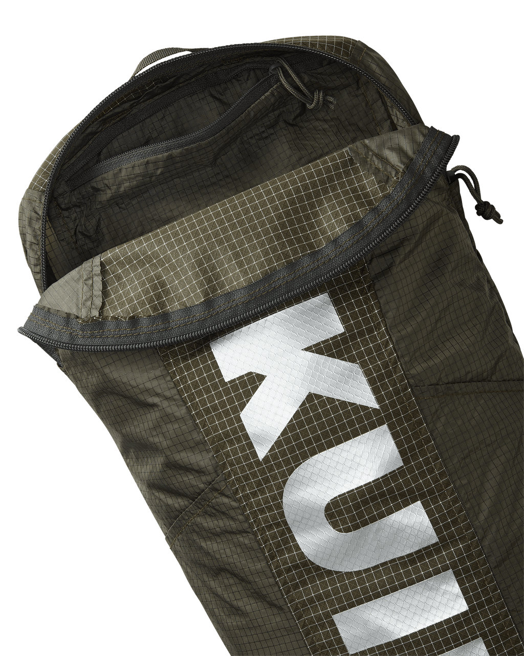 Close-up of Extreema Stuffable Pack in Ash Brown, Highlighting unzipped inside pocket