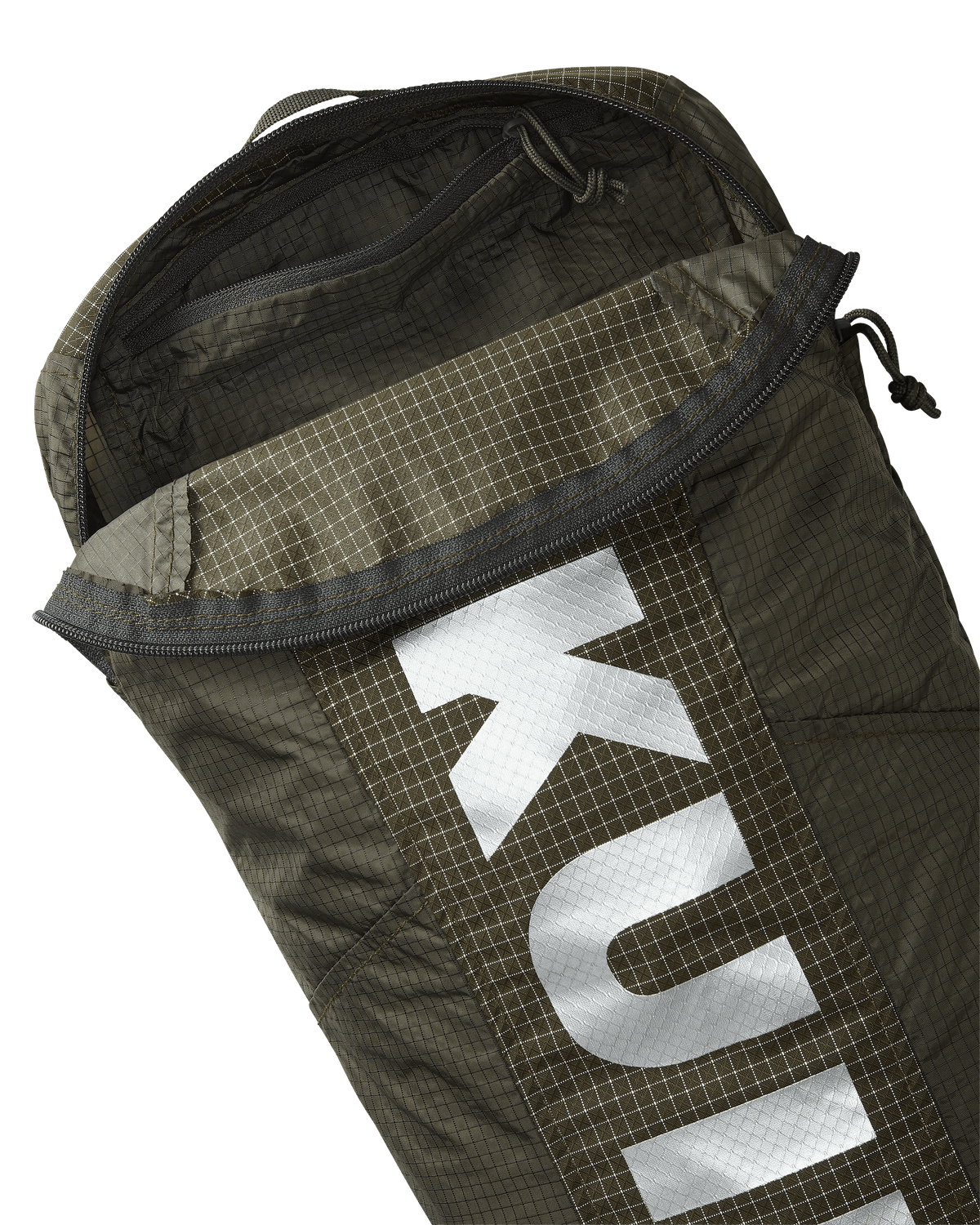 Close-up of Extreema Stuffable Pack in Ash Brown, Highlighting unzipped inside pocket
