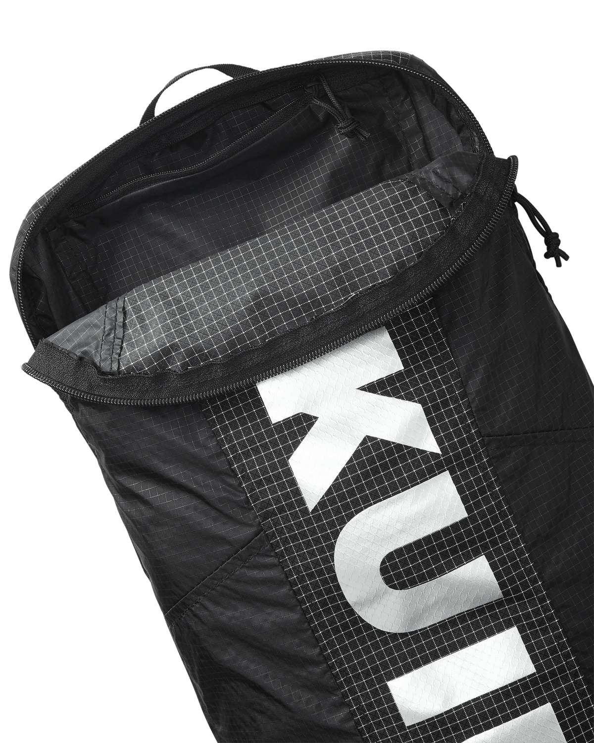 Close-up of Extreema Stuffable Pack in Black, Highlighting unzipped inside pocket
