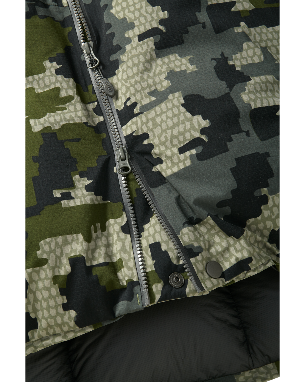 Bottom of Super Down Burner Parka in Verde Camouflage Highlighting Dual YKK Aquaguard Main Zipper