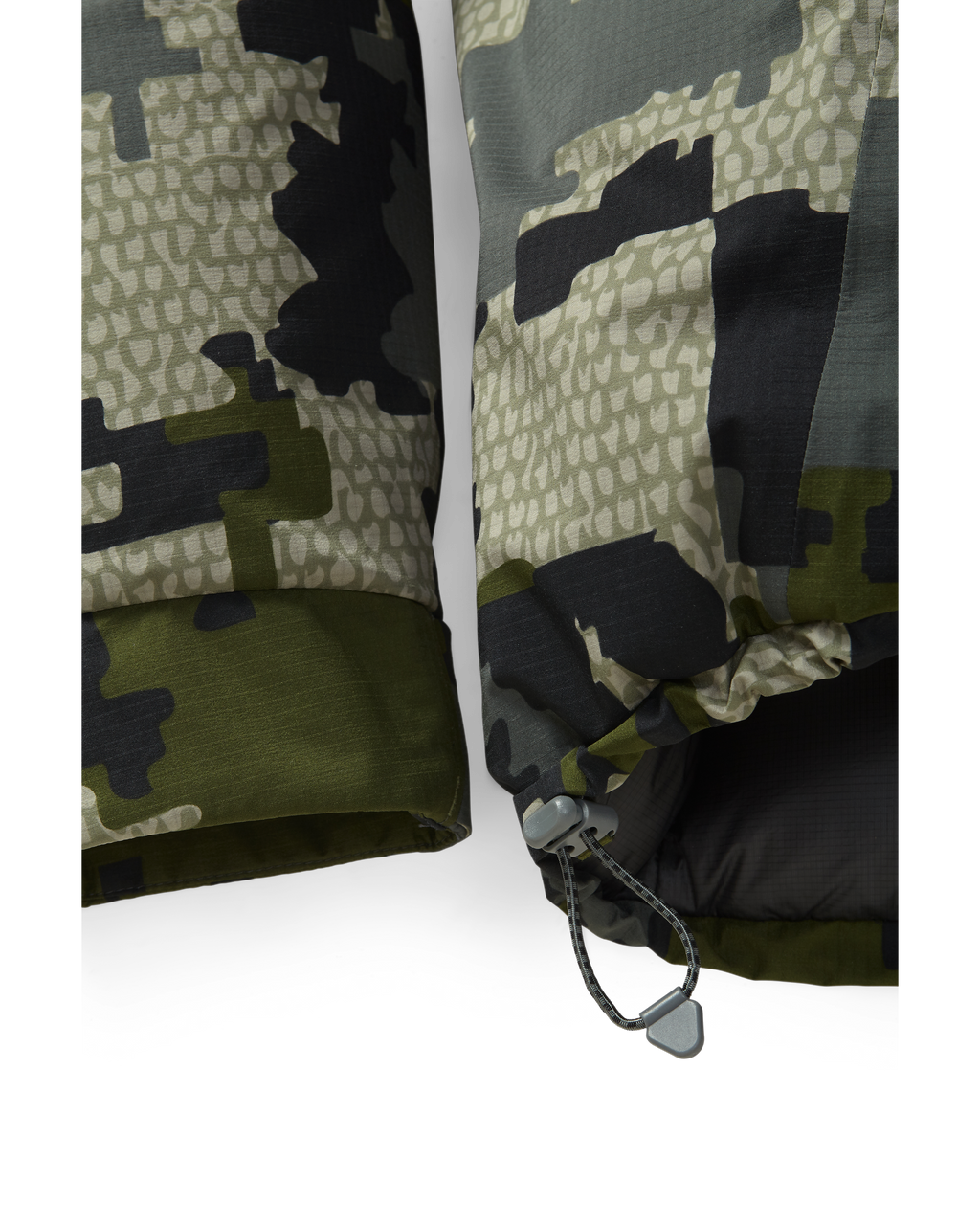 Front, Lower View of Super Down Burner Parka in Verde Camouflage Highlighting Dual Adjust Hem Cinch
