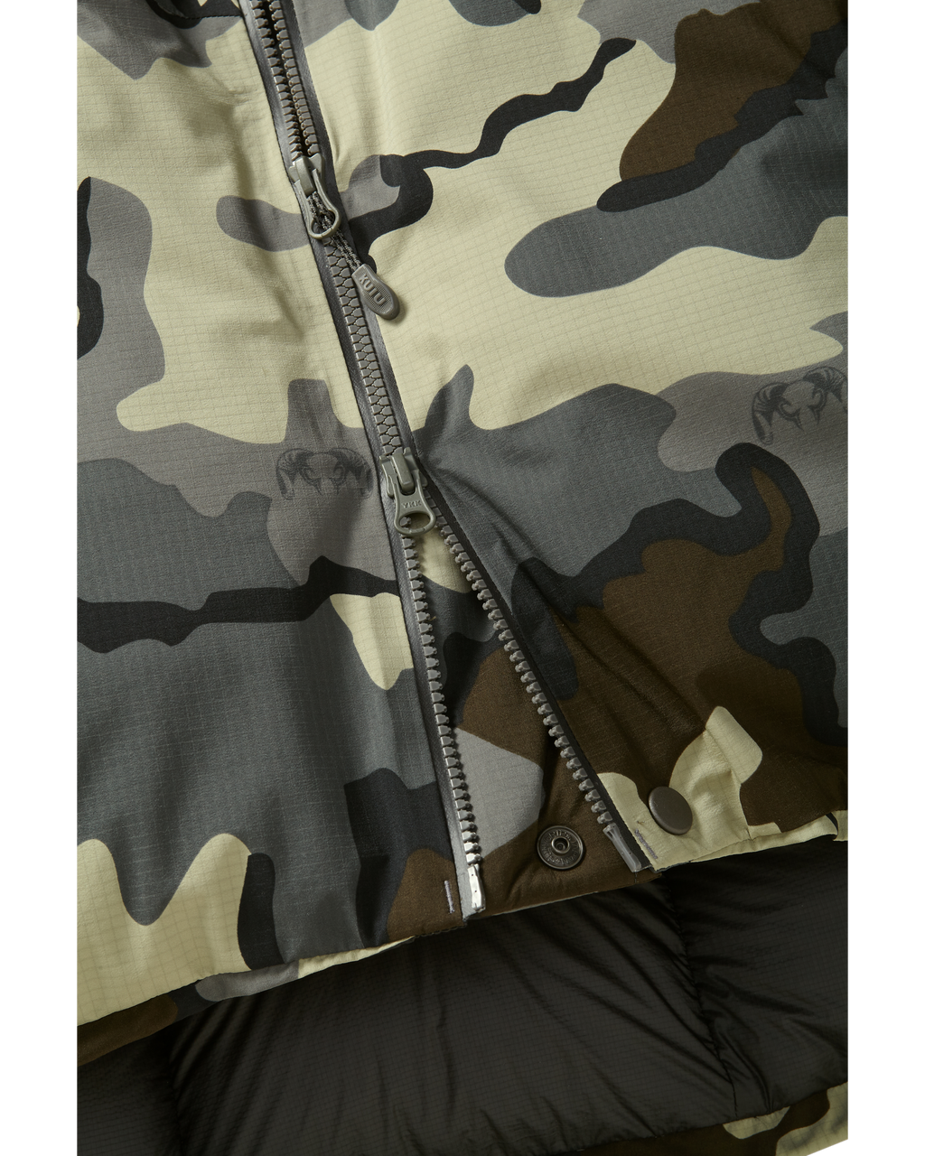 Bottom of Super Down Burner Parka in Vias Camouflage Highlighting Dual YKK Aquaguard Main Zipper