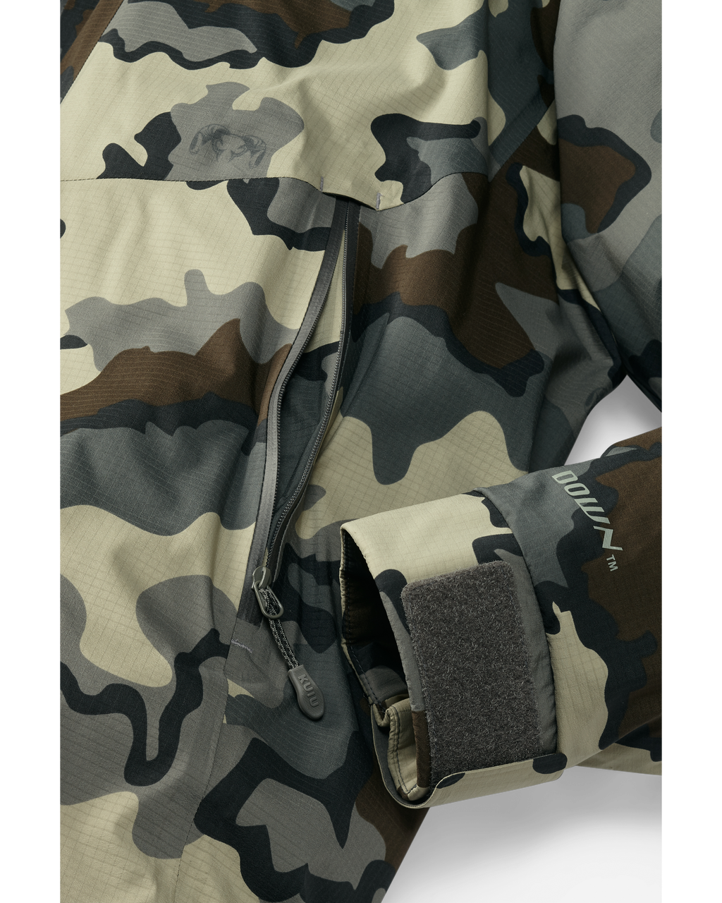 Bottom of Super Down Burner Parka in Vias Camouflage Highlighting YKK Aquaguard Zippered Hand Pocket and Adjustable Cuff