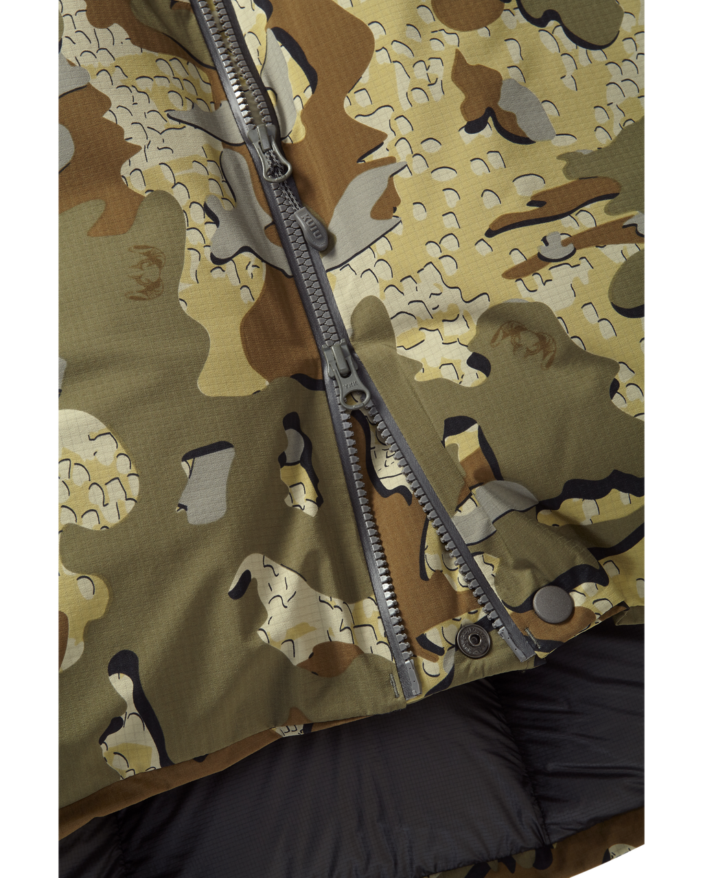 Bottom of Super Down Burner Parka in Valo Camouflage Highlighting Dual YKK Aquaguard Main Zipper