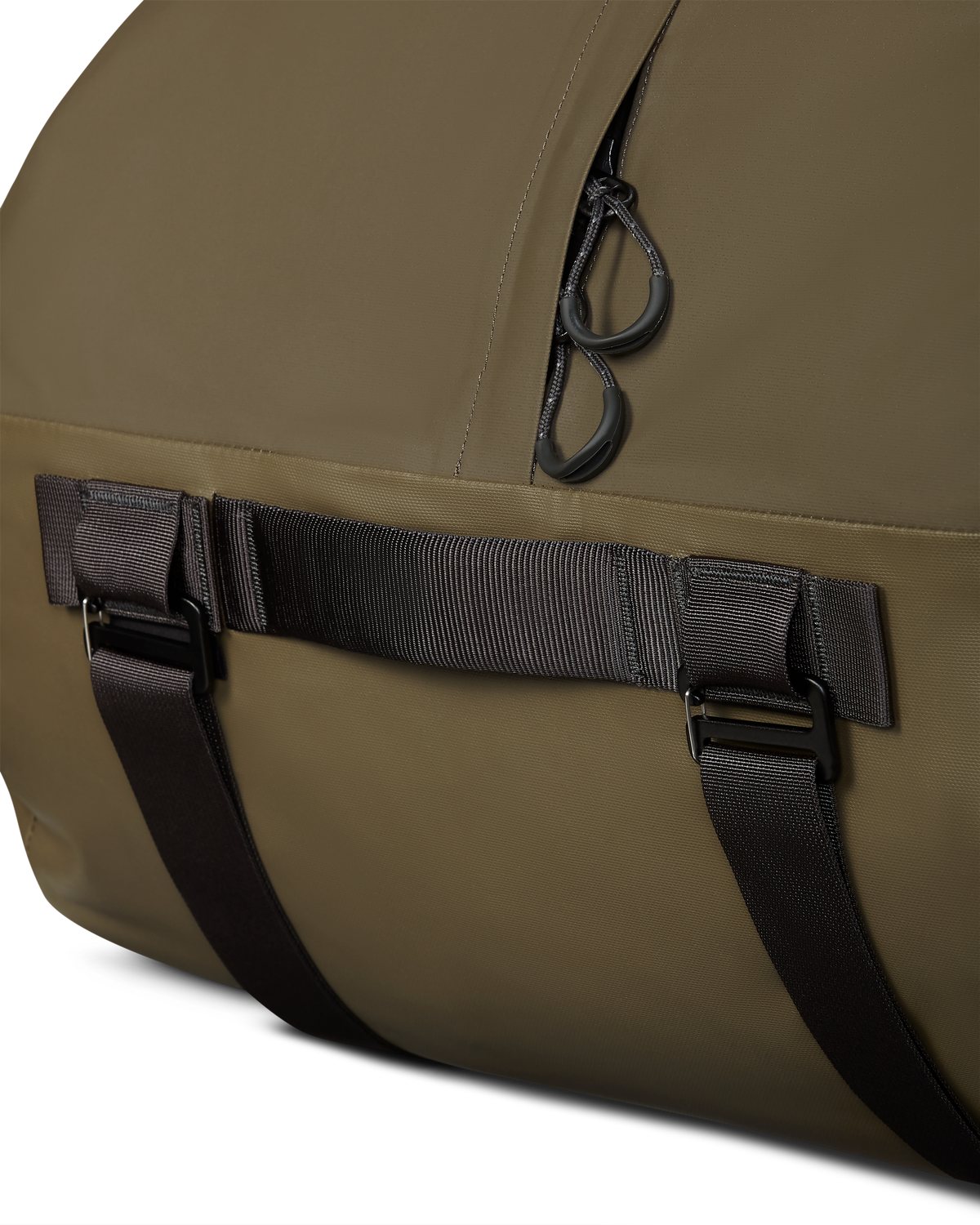 Close-up of top grab handle and corded pull tabs on the Taku BLSTX 4200 Duffel in  Coyote Brown