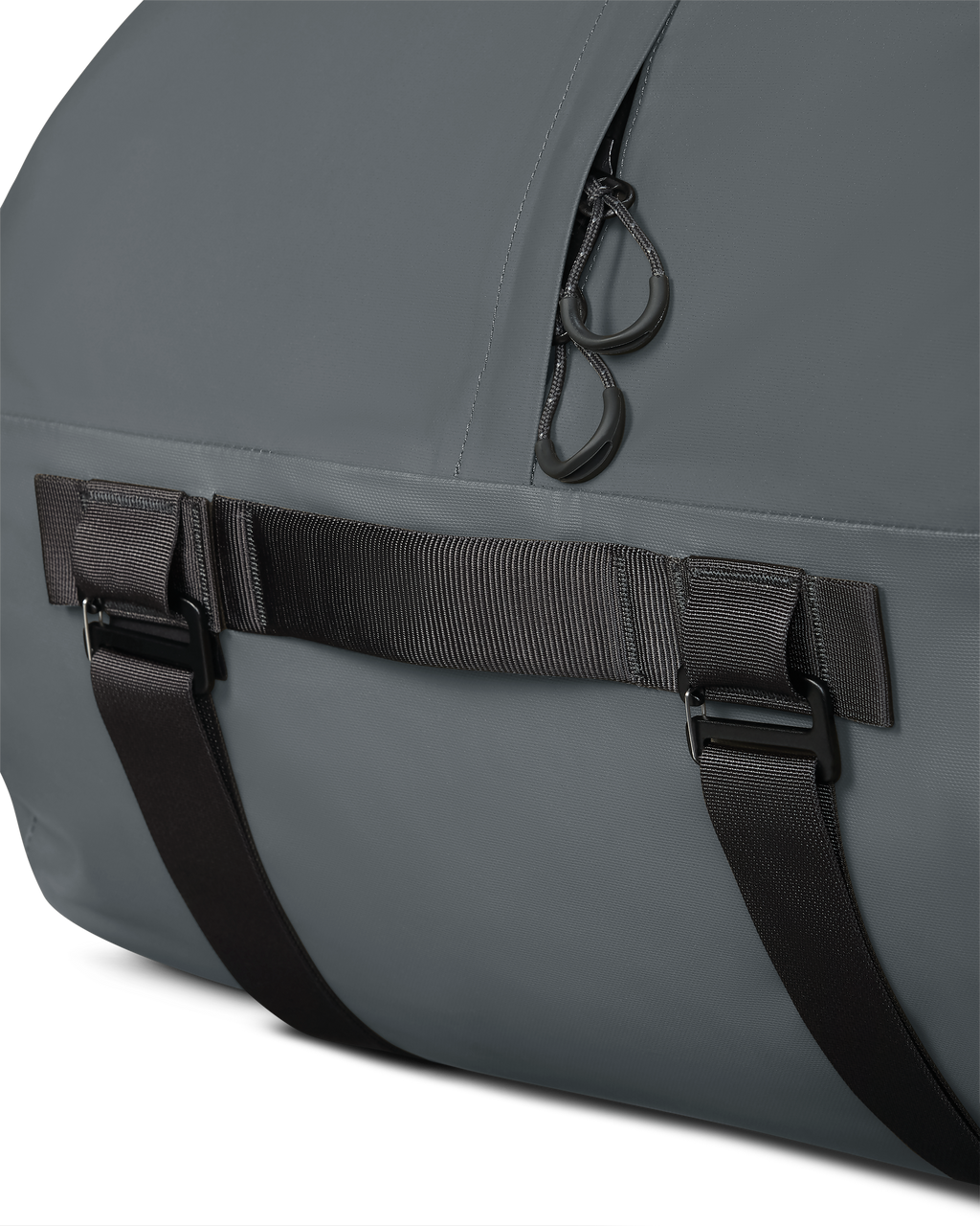Close-up of top grab handle and corded pull tabs on the Taku BLSTX 4200 Duffel in Gunmetal Grey