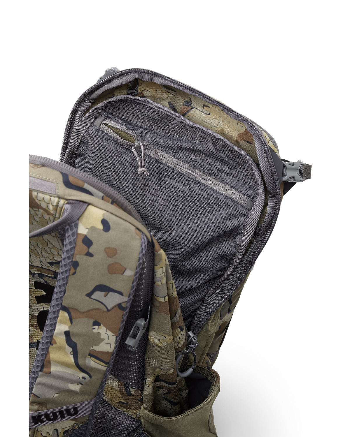 Divide 1500 in Valo Camouflage with main compartment open to show internal zipper pocket