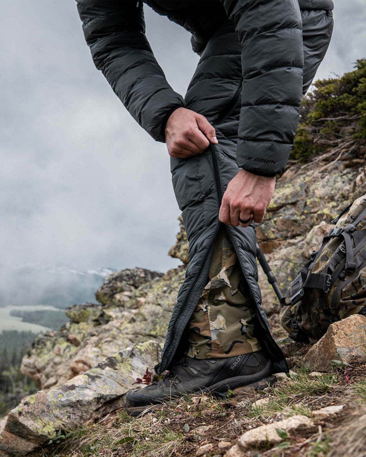 Hunter Zipping Down Full Length Leg Zipper on Super Down LT Pants In Gunmetal Grey