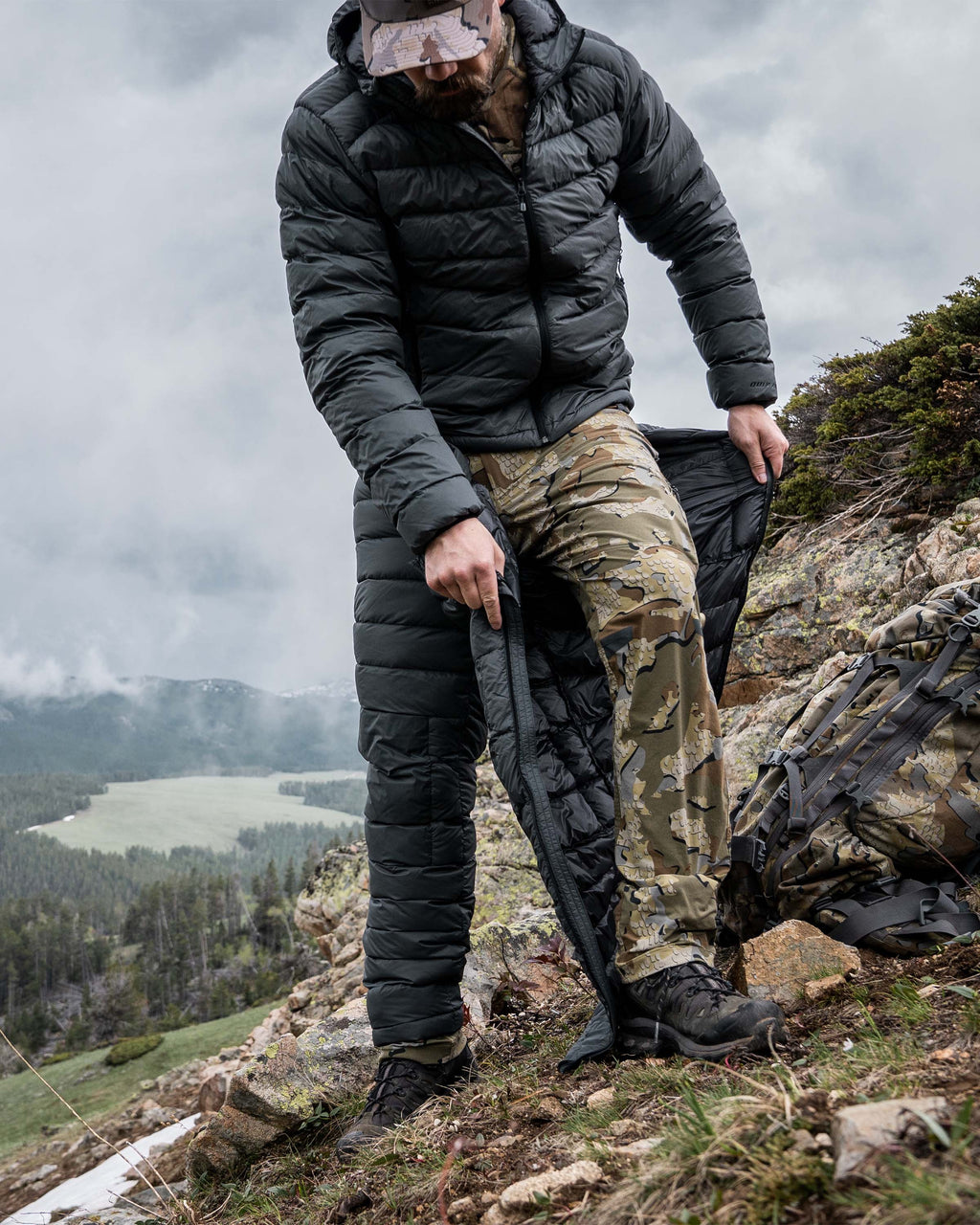 Hunter Showing Open Full Length Leg Zipper on Super Down LT Pants In Gunmetal Grey