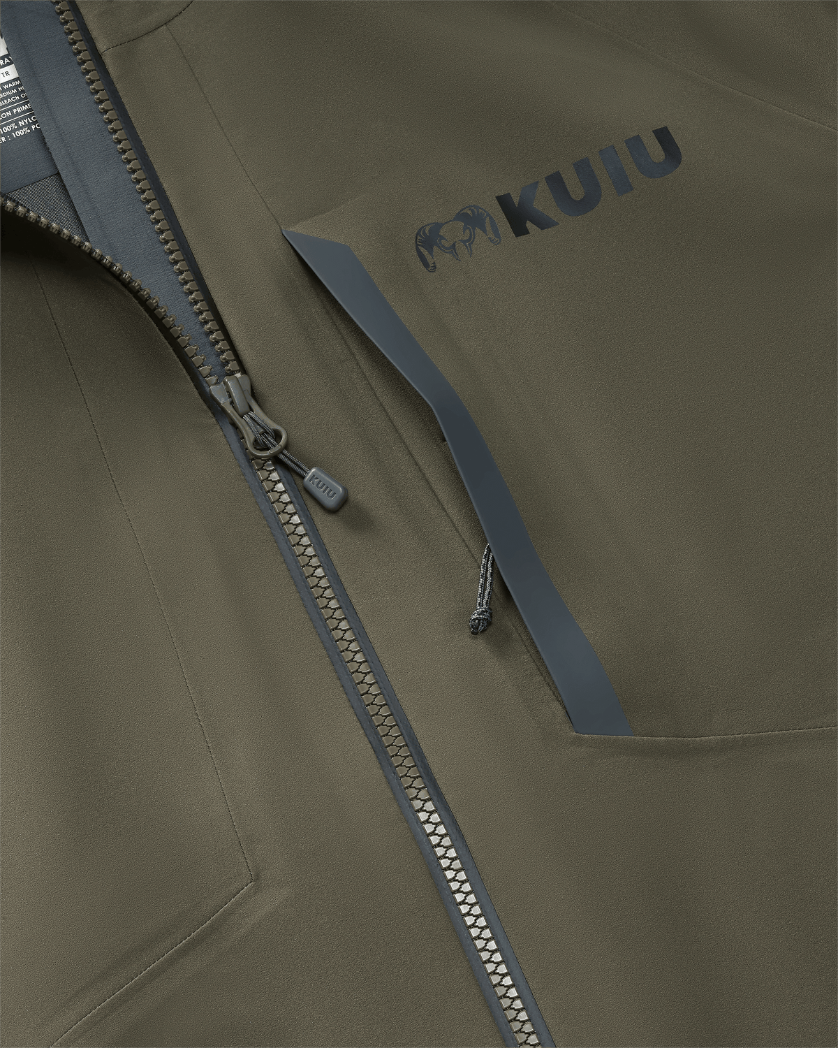 Front of Womens Chugach TR Rain Jacket in Ash Brown Color Highlighting YKK Aquaguard Zippered Chest Pocket