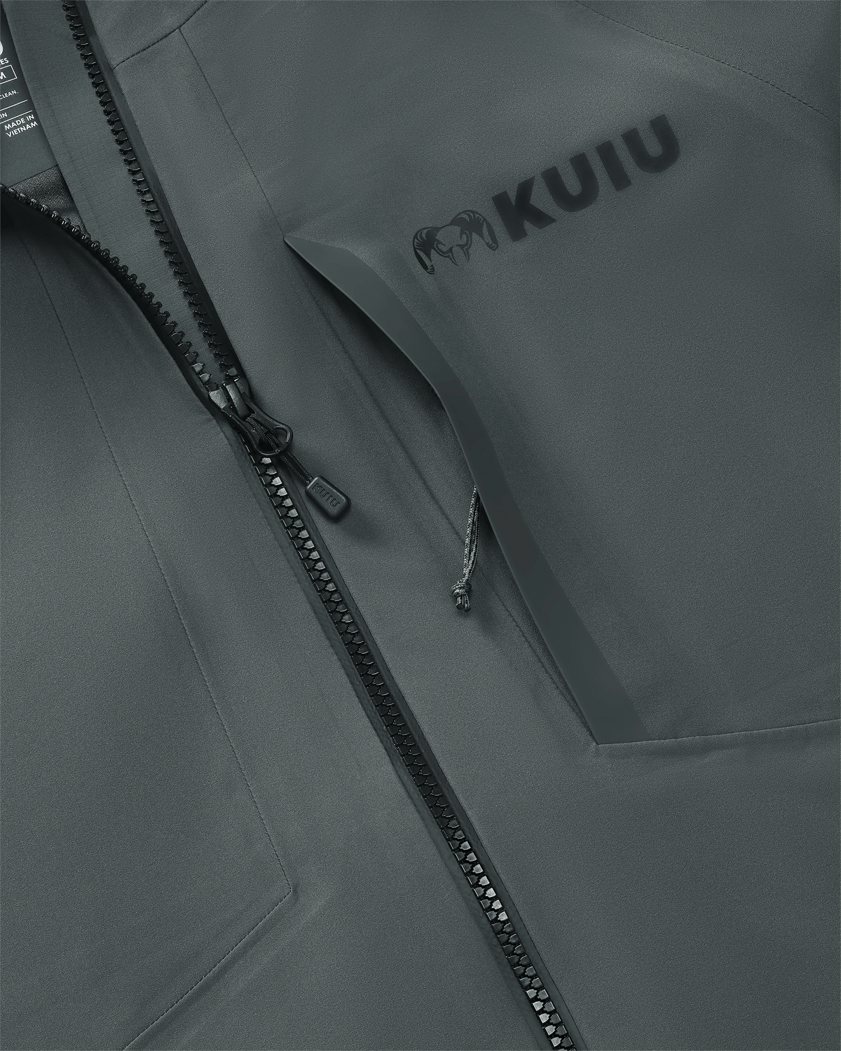 Front of Womens Chugach TR Rain Jacket in Gunmetal Grey Color Highlighting YKK Aquaguard Zippered Chest Pocket