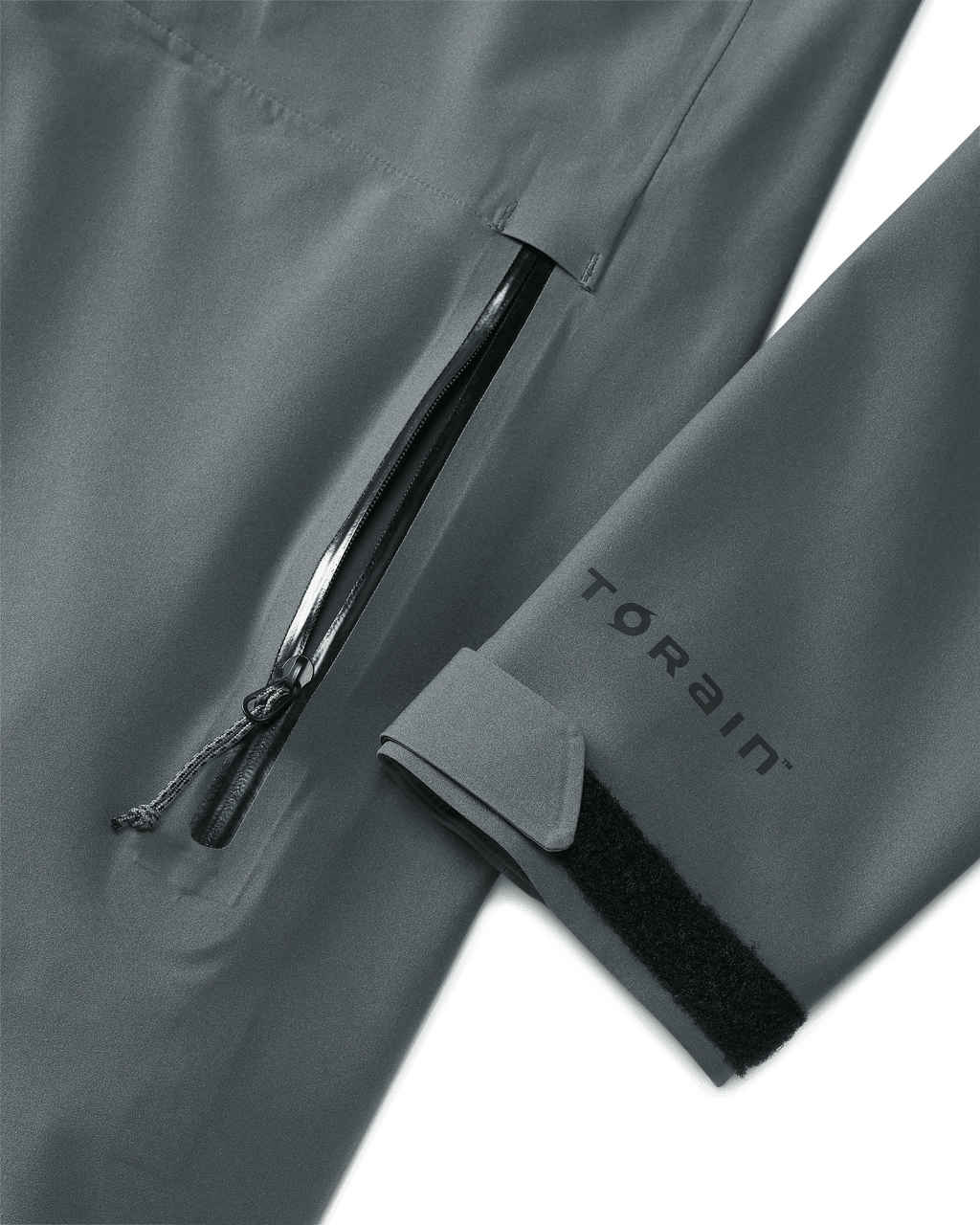 Front of Womens Chugach TR Rain Jacket in Gunmetal Grey Color Highlighting YKK Aquaguard Zippered Hand Pocket
