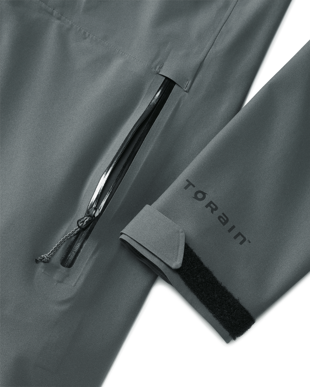Front of Womens Chugach TR Rain Jacket in Gunmetal Grey Color Highlighting YKK Aquaguard Zippered Hand Pocket