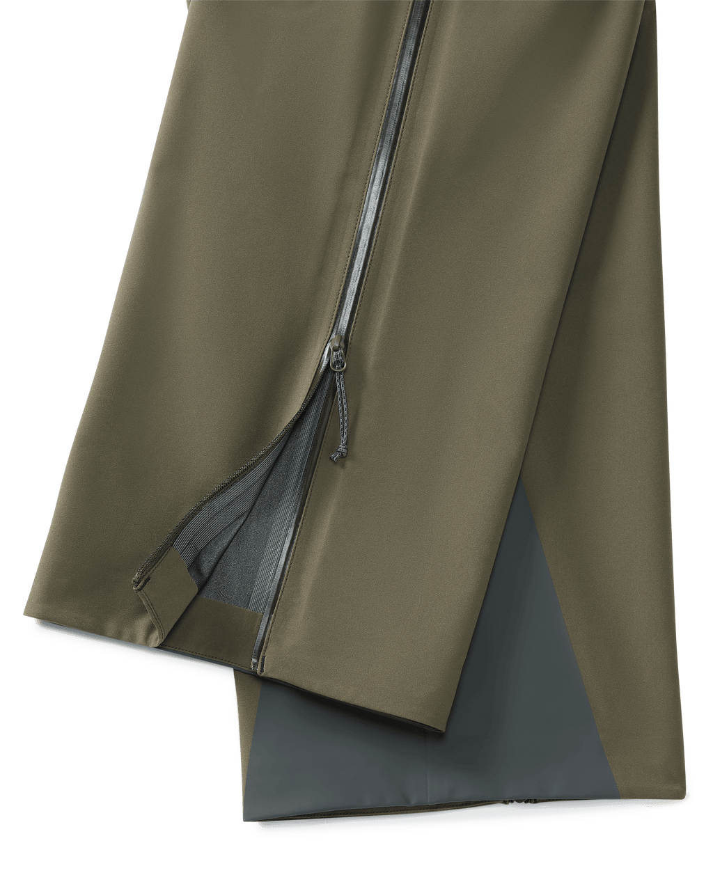 Lower, Side View of Women's Chugach TR Rain Pants in Ash Brown Color Highlighting Full Length YKK Leg Zipper and Bemis Overlay Film Scuff Guards
