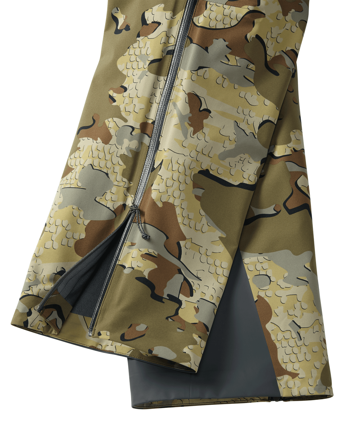 Detail of lower leg hem and partially opened lower zipper on Women's Chugach TR Rain Pant in Valo Camouflage