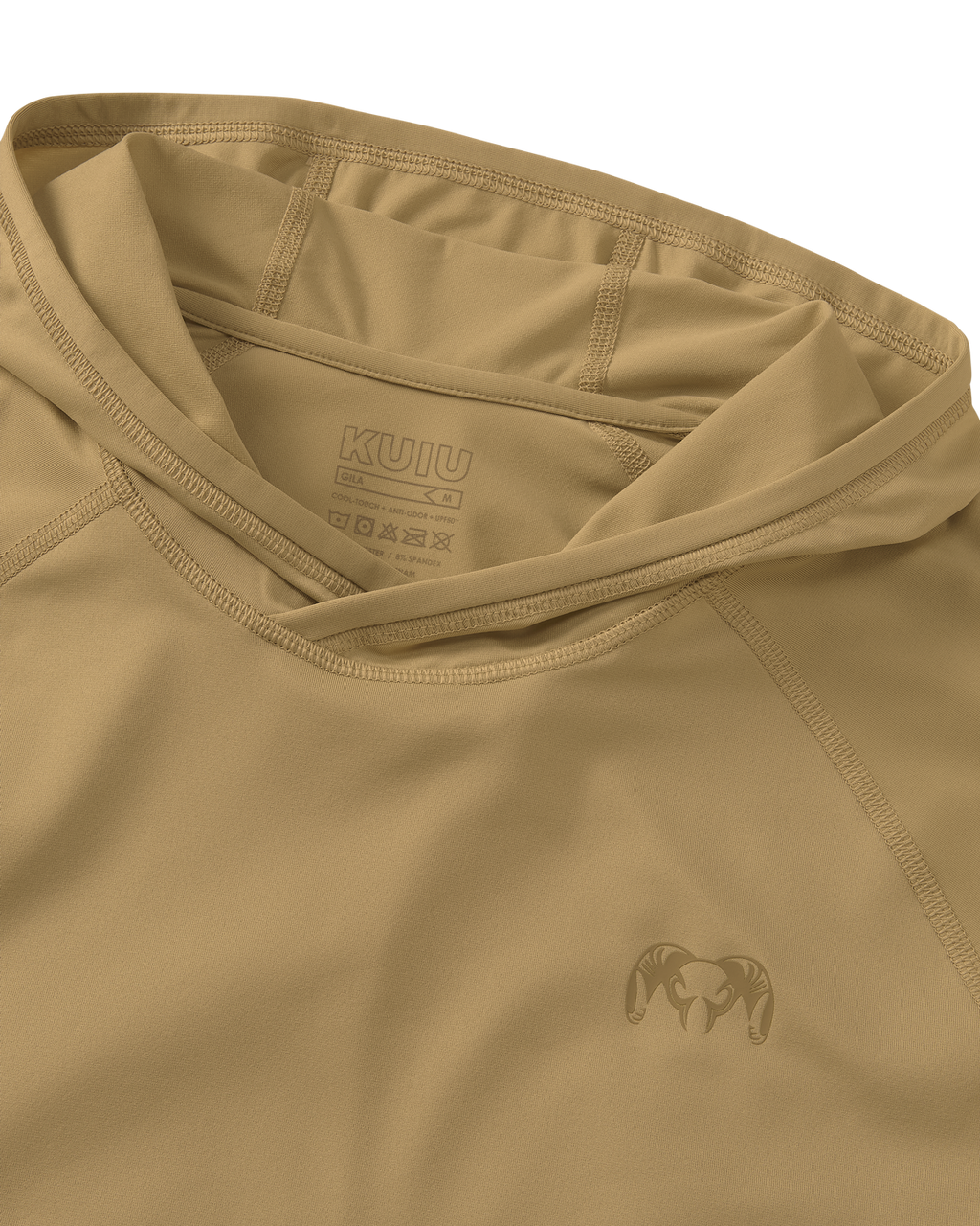 Close-up flat lay view of flatlock seams, folded hood, and KUIU Ram logo on left chest of Gila Long Sleeve Hoodie in Dune Khaki