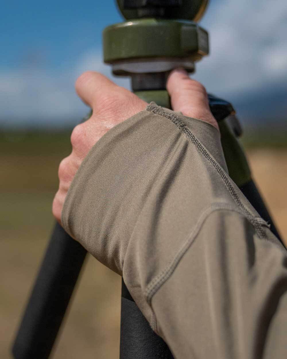 Closeup thumbhole on Gila Long Sleeve Hoodie in Khaki