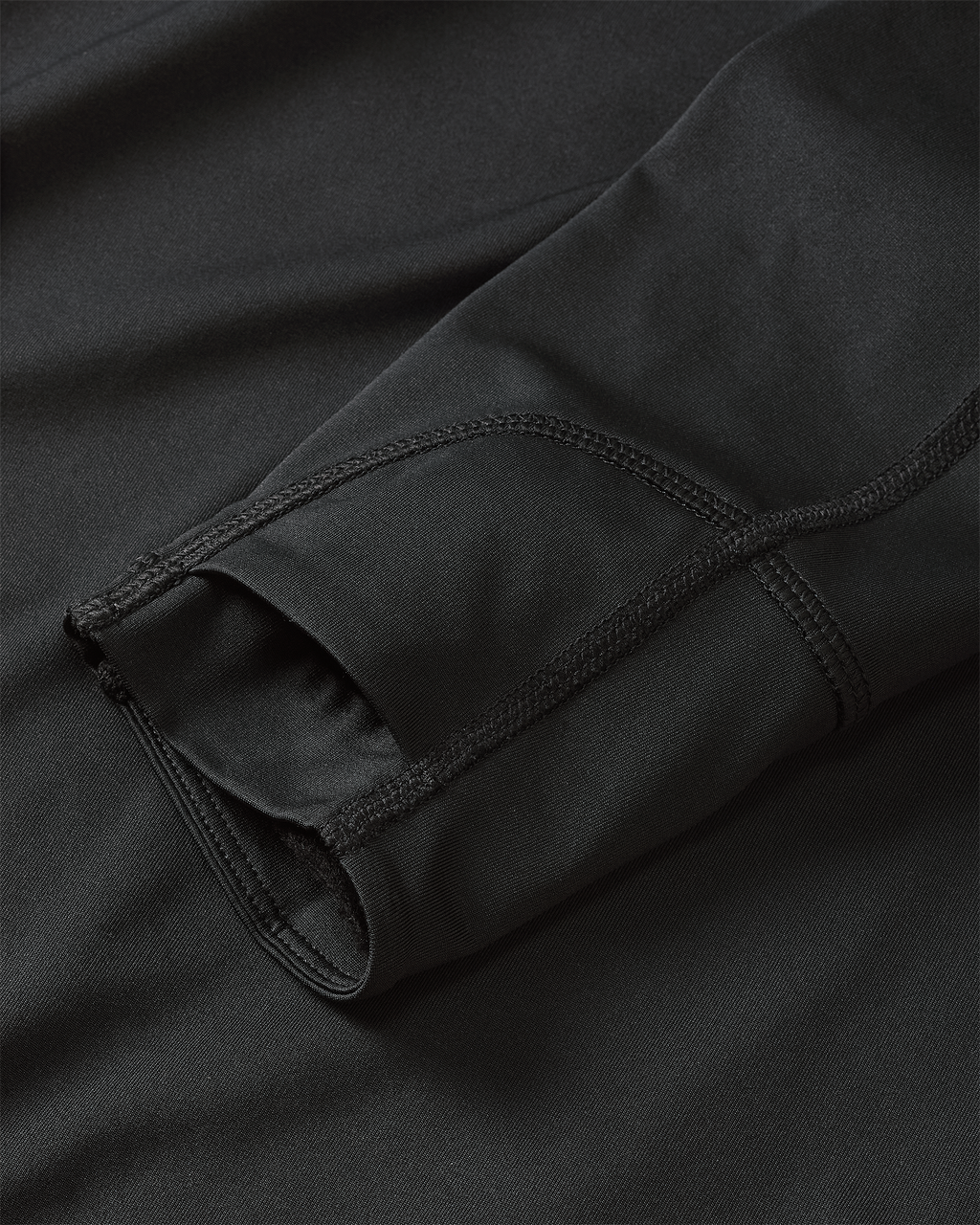 Layered thumbhole on Women's Gila LS Hoodie in Black