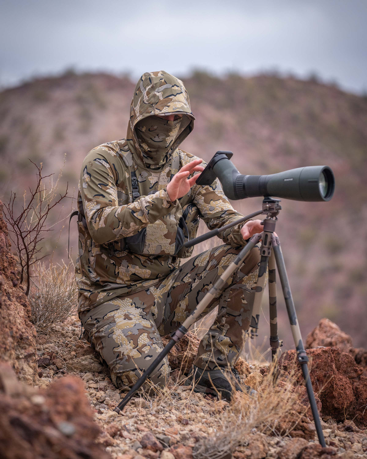 Hunter Digiscoping with Spotting Scope in Gila Pro Long Sleeve Hoodie in Valo Camouflage