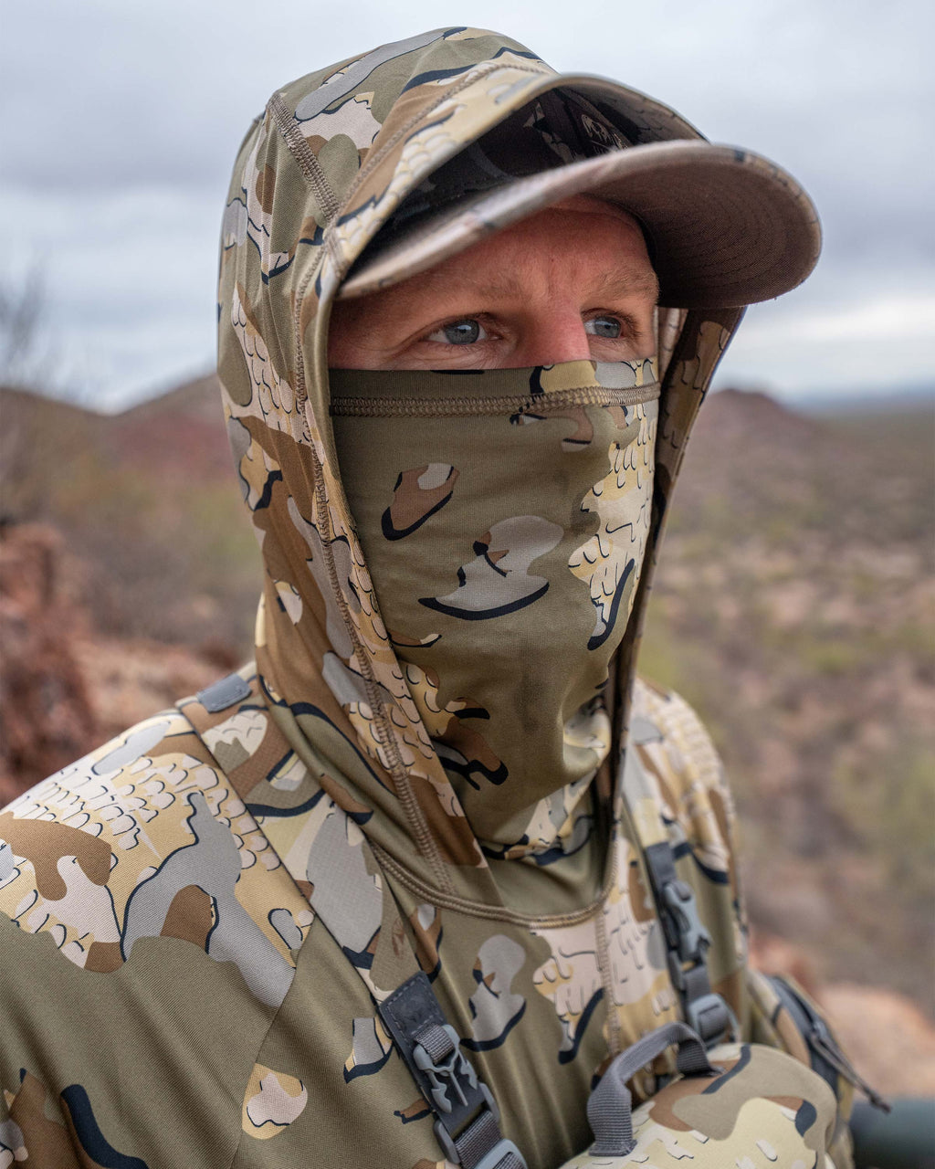 Hunter in Gila Pro Long Sleeve Hoodie in Valo Camouflage Highlighting Built-in Neck Gaiter