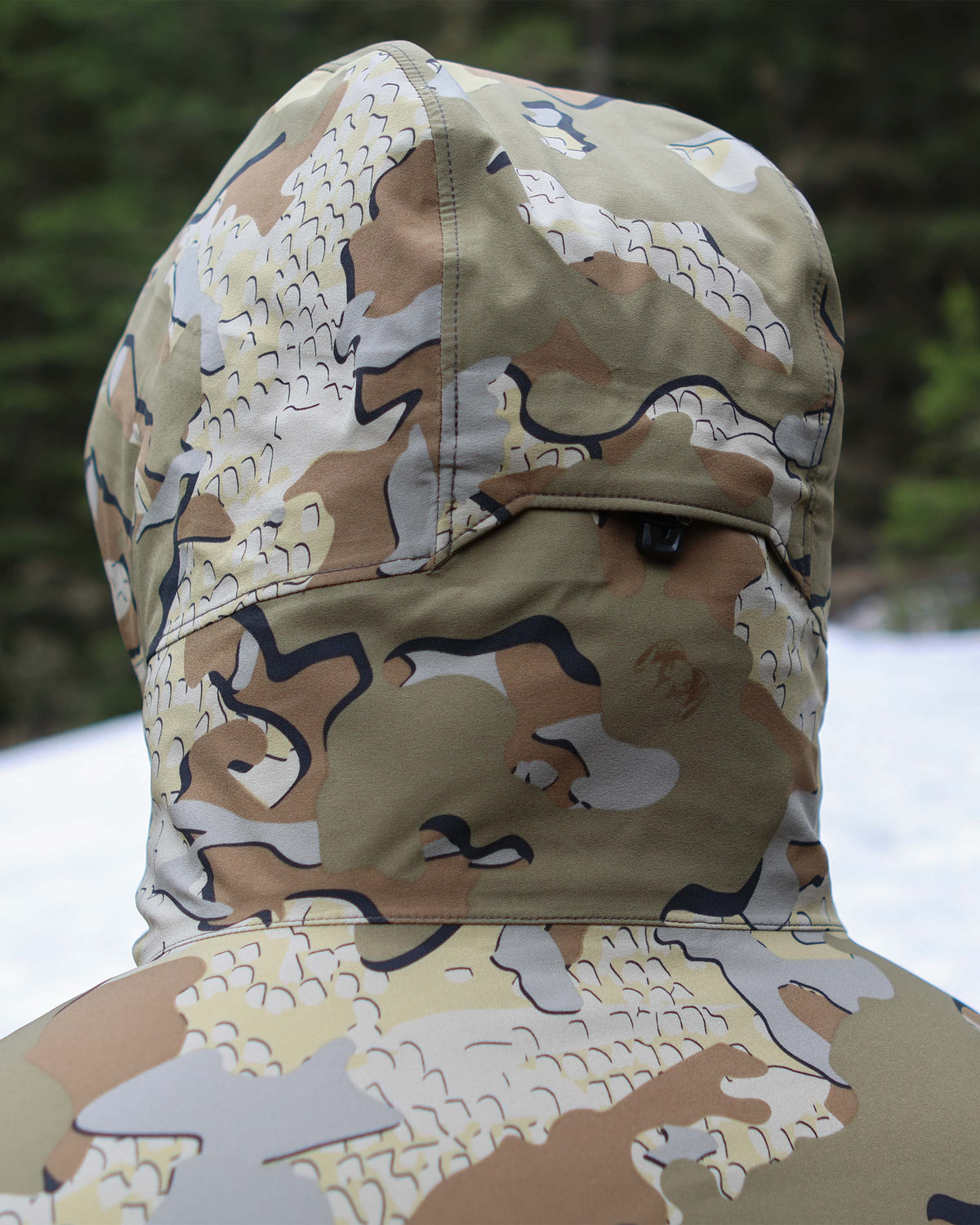 Back of Mountain PRO Hooded Jacket in Valo Camouflage, highlighting adjustable hood cinch