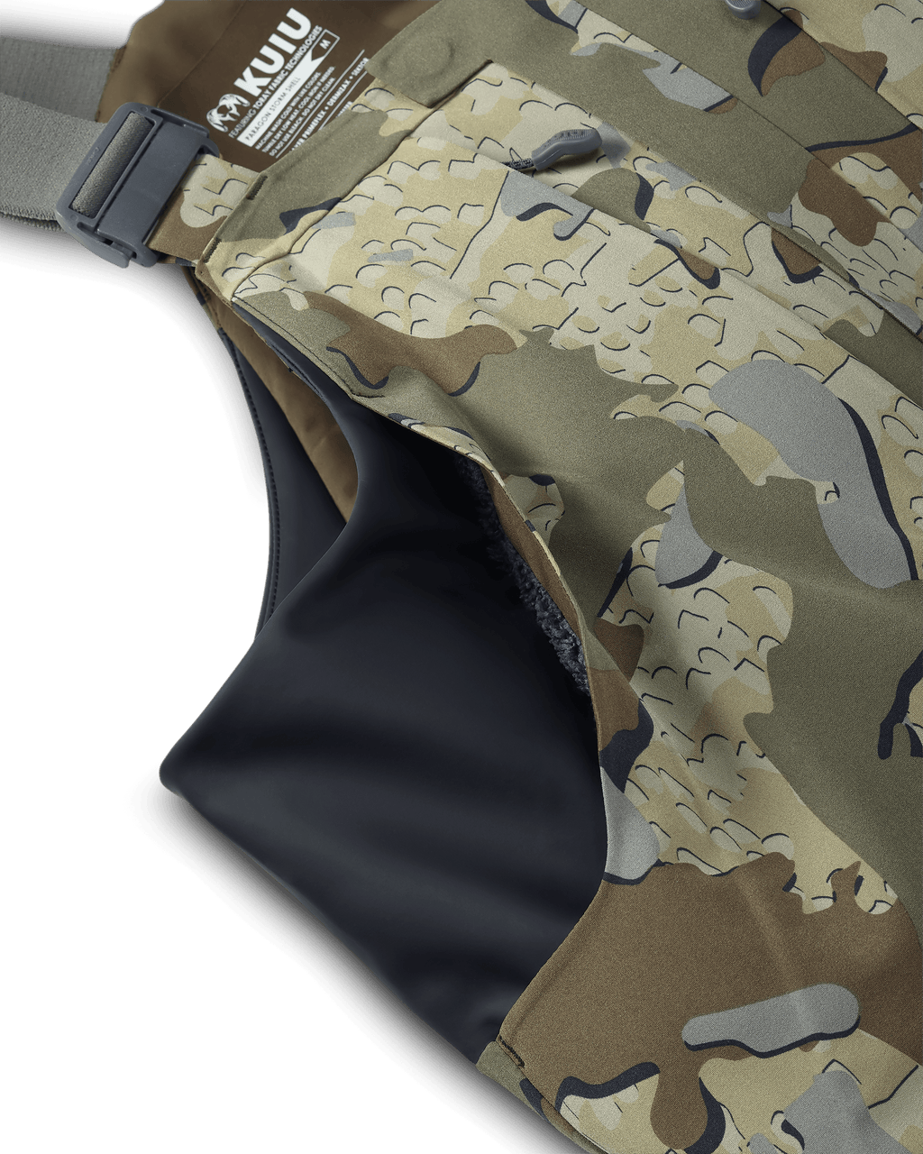 Stretch side paneling and Sherpa fleece-lined hand pockets on the KUIU Paragon Storm Shell Bib for waterfowl hunting