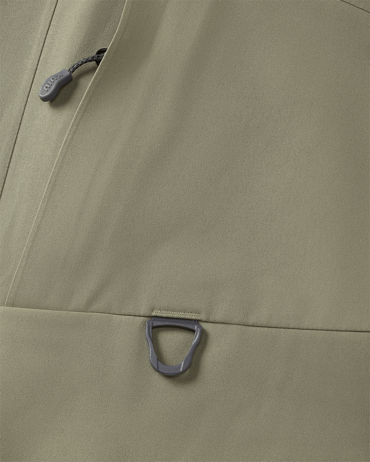 D-loop accessory attachment points at front chest on Paragon Storm Shell Parka in Arctic Shadow Khaki