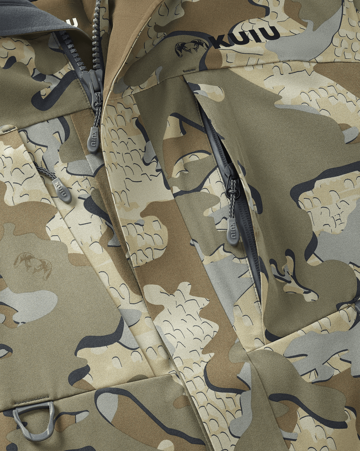 Close-up, front view of Paragon Storm Shell Parka in Valo Camouflage, Highlighting vertical zippered chest pockets and D-loop accessory attachment points at front chest