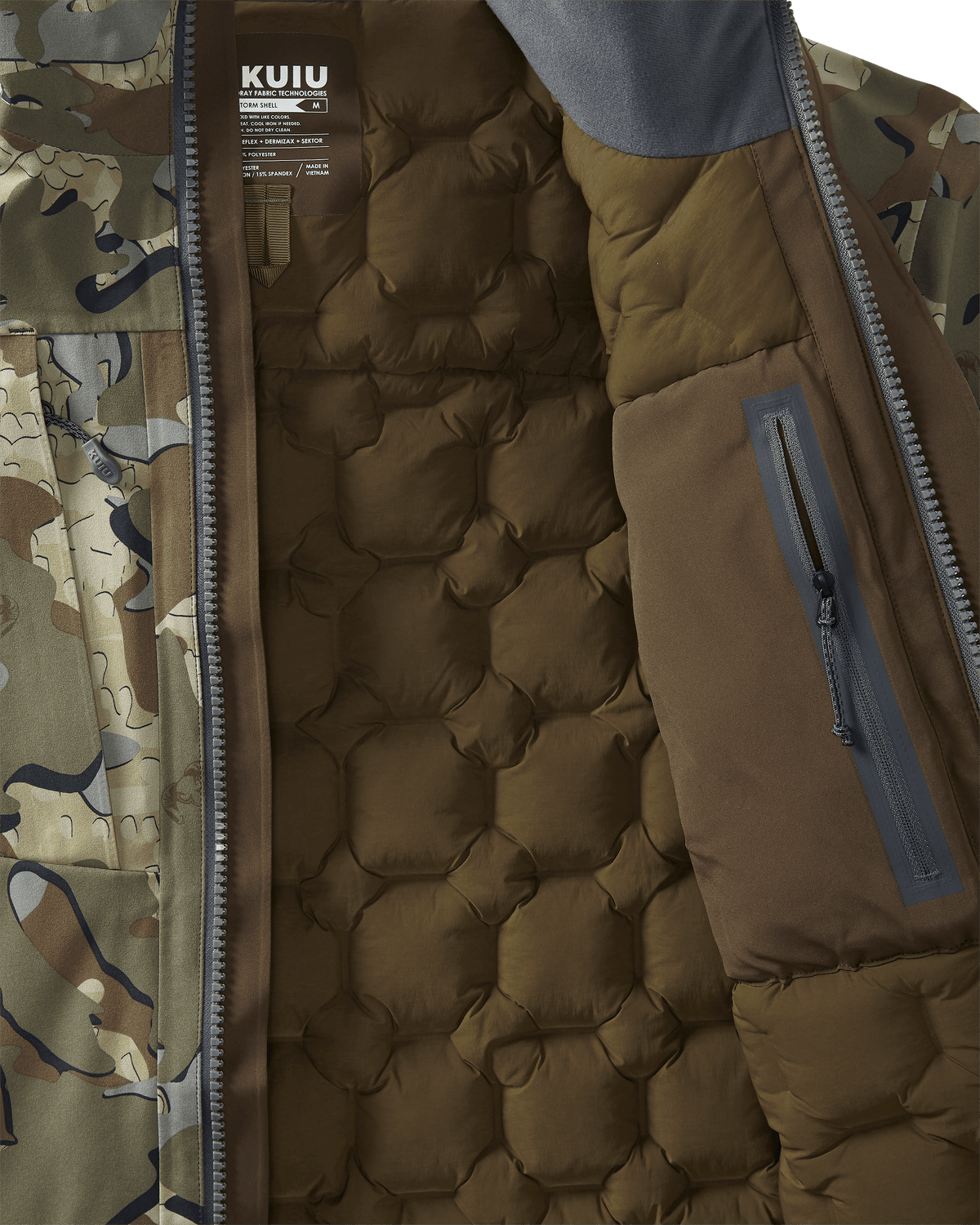 Interior Sektor stitch-free woven baffles and vertical zipped pocket on KUIU Paragon Storm Shell Parka in Valo Camouflage