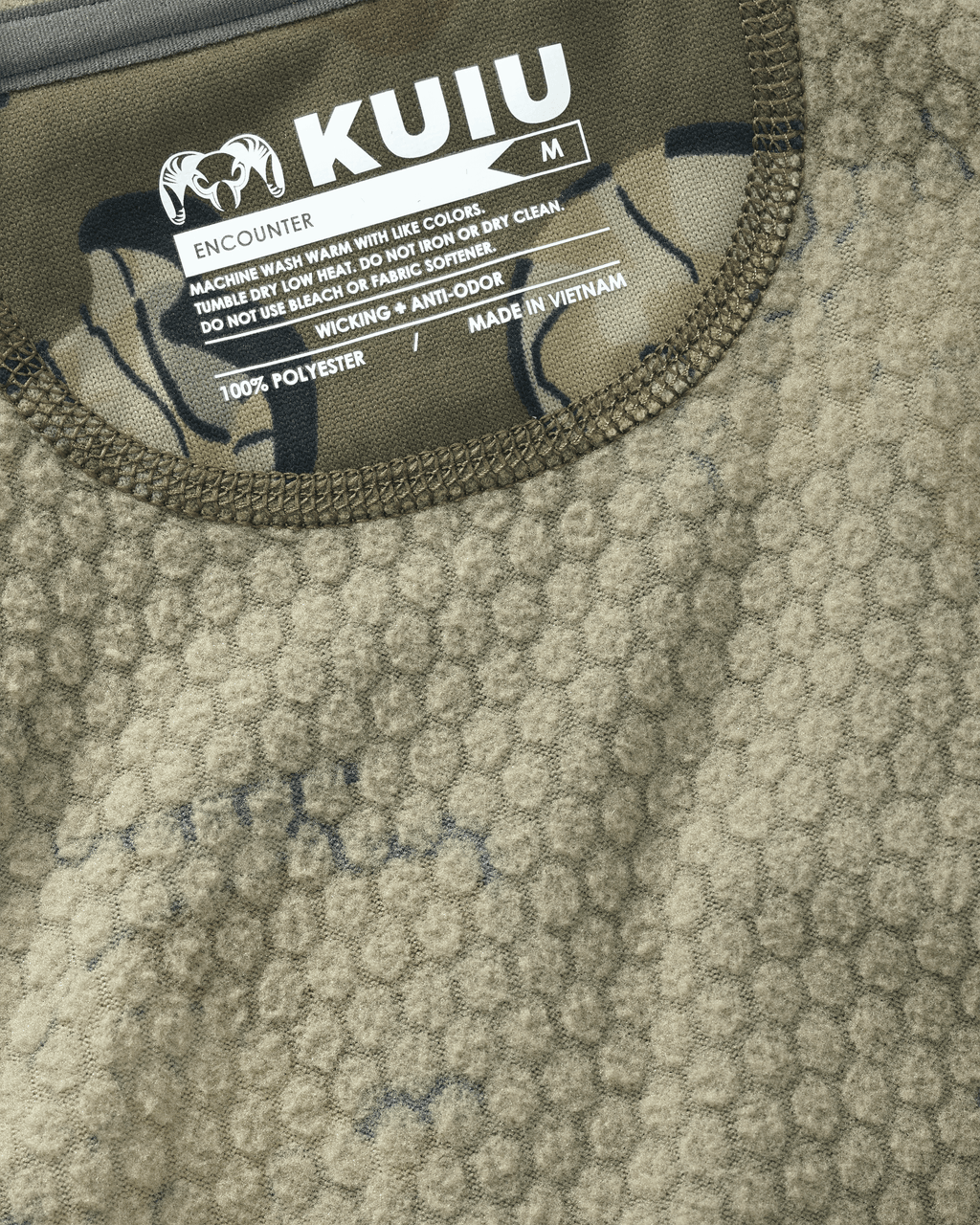 Inside of Encounter 200 Fleece Zip-T in Valo Camouglage Highlighting 100% Polyester Jacquard Fleece