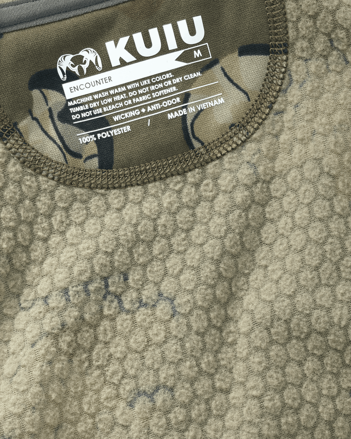 Inside of Encounter 200 Fleece Zip-T in Valo Camouglage Highlighting 100% Polyester Jacquard Fleece