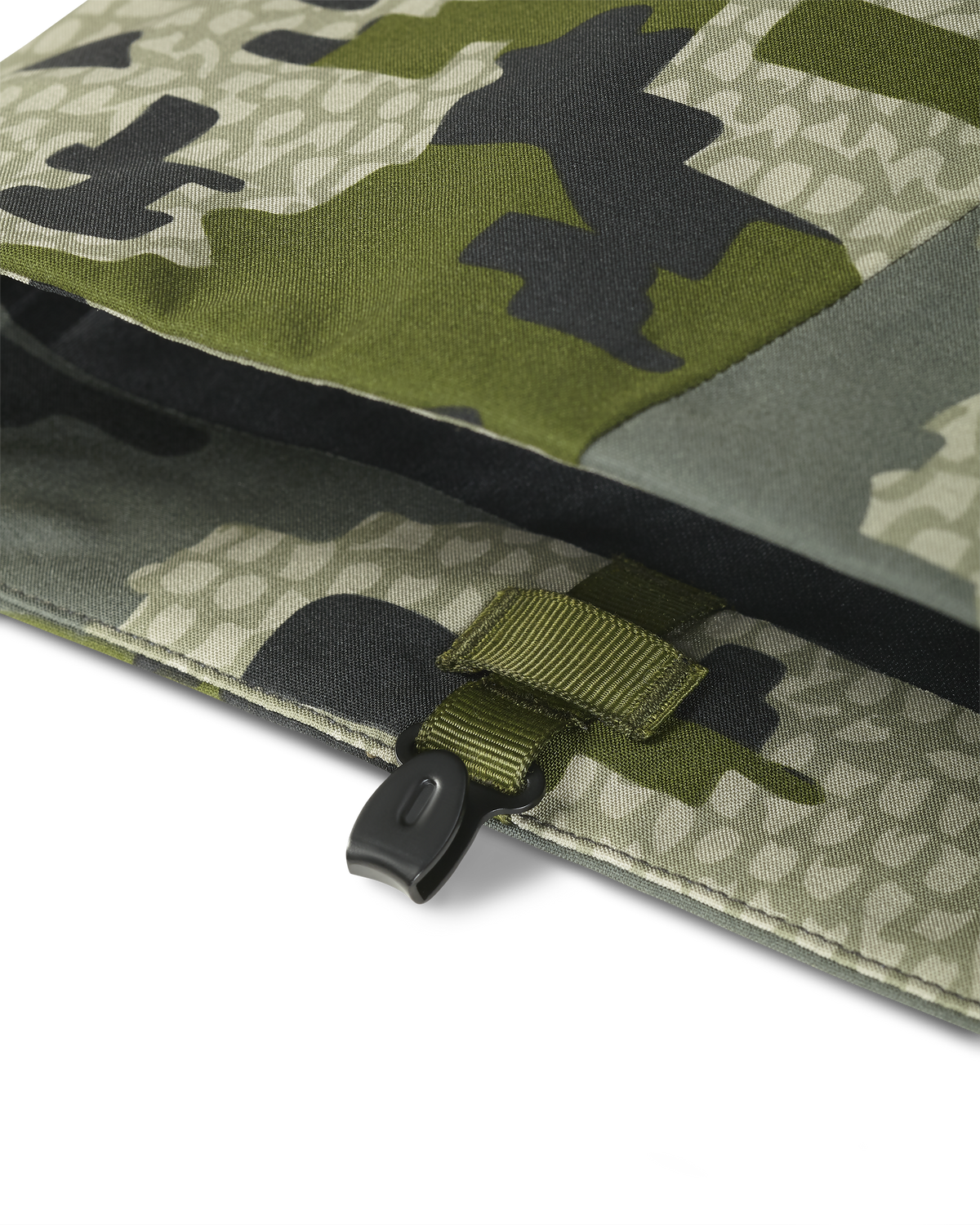 Detail of bottom Boot hook with keeper loop on the Kutana Hybrid Pant in Verde Camouflage