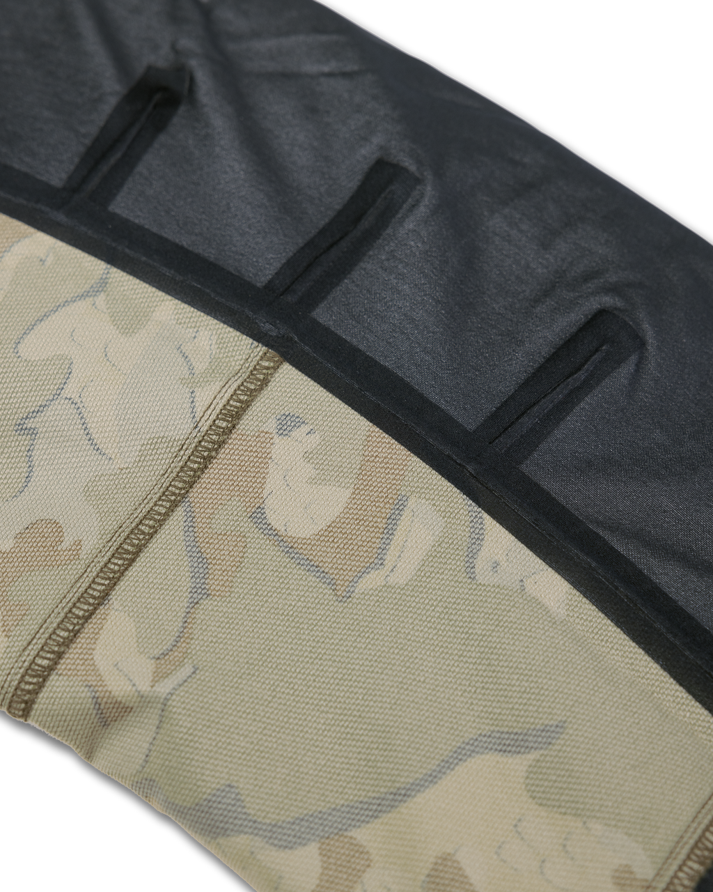 Detail lower leg inside seam tape on the Kutana Hybrid Pant in Valo Camouflage
