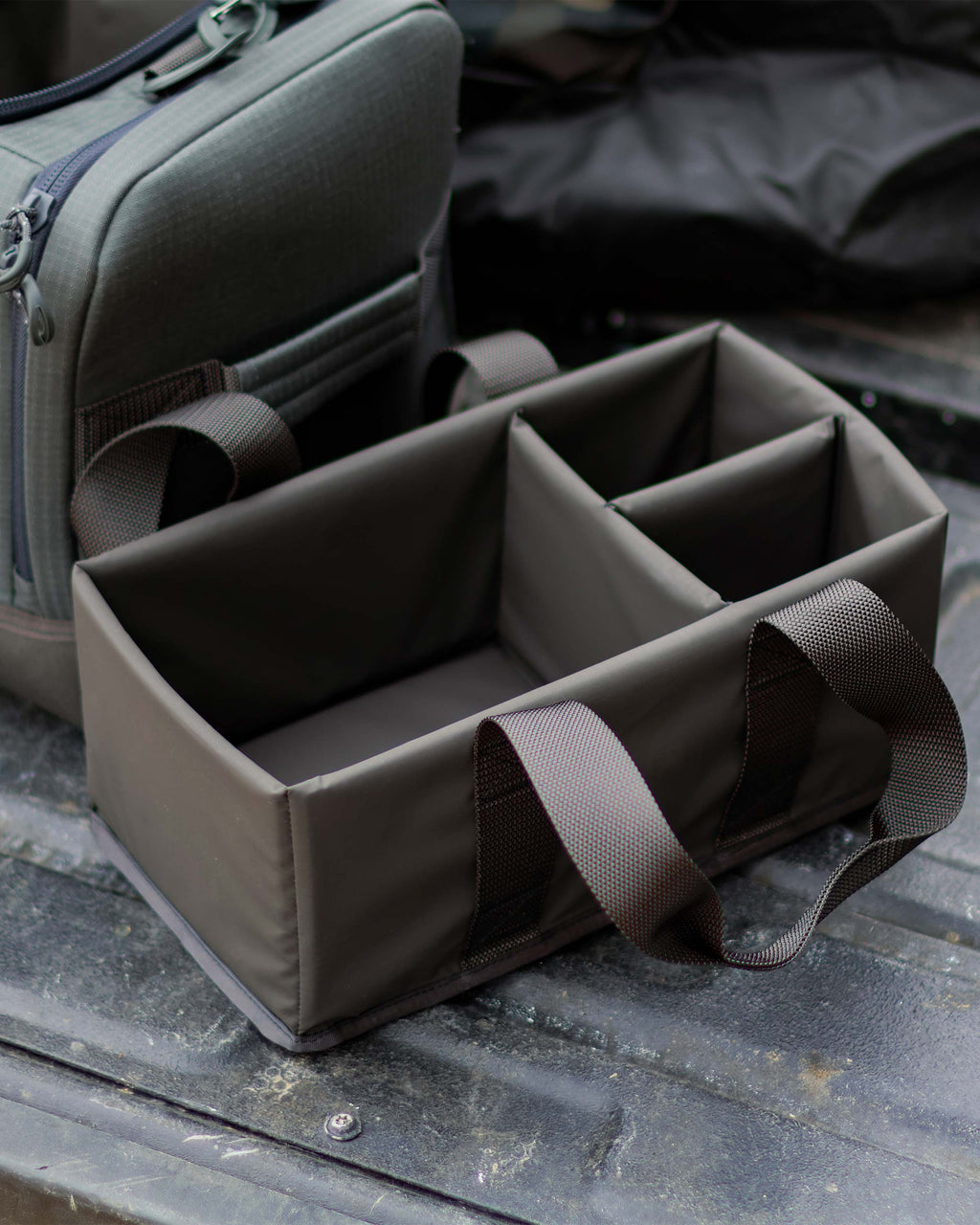 Distance Duffel removable internal tote with three inner divided compartments.